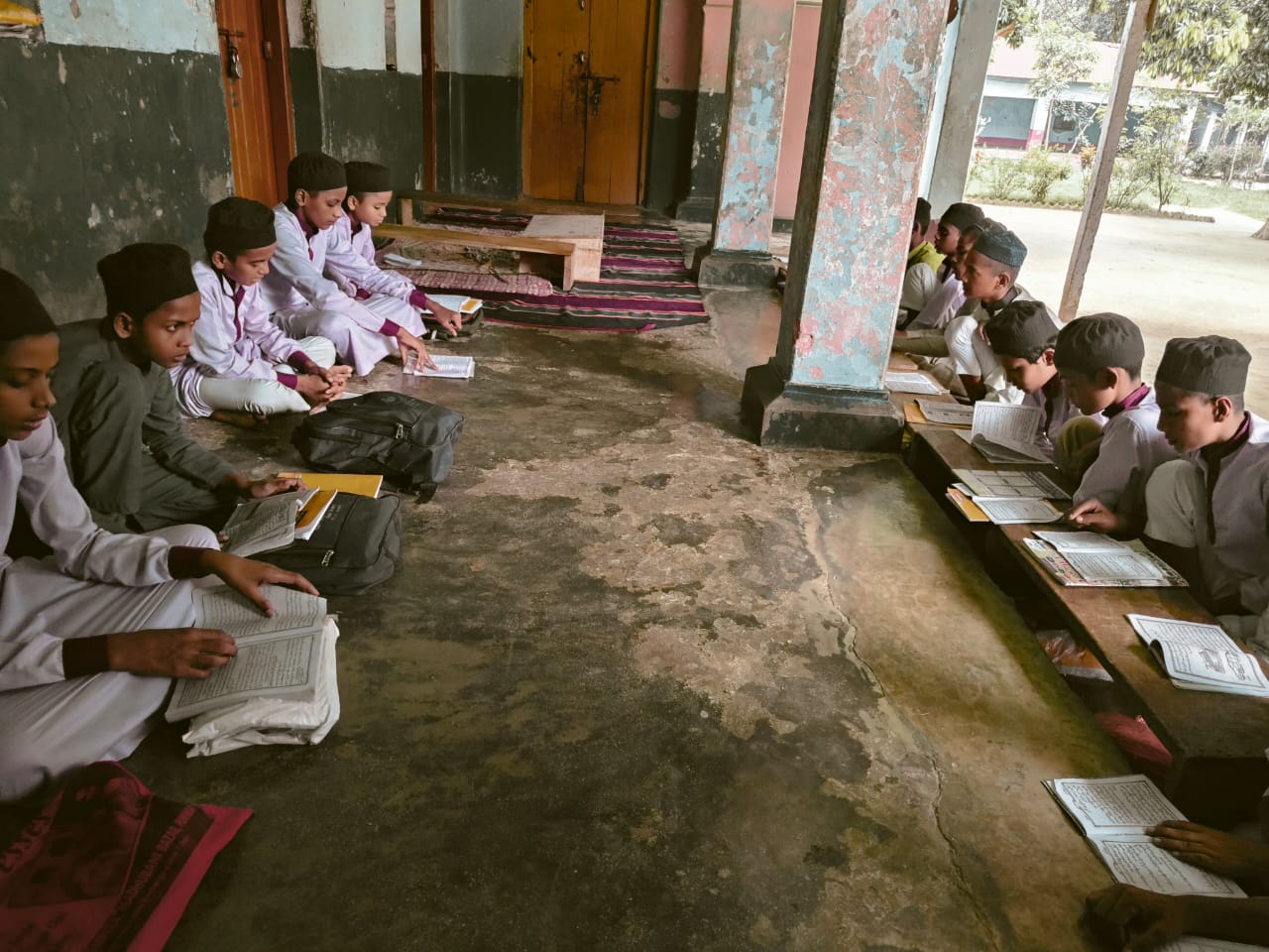 Modern science laboratory at Jamia Usmania with students conducting experiments