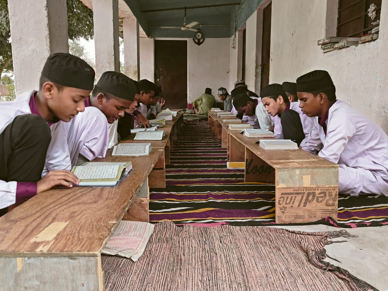 Jamia Usmania college cafeteria with students eating and socializing
